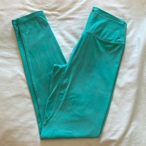 stori perseverance tight in sun fade pool blue size 6